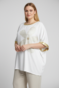 White Butterfly Tunic with Gold Trim on Plus-Size Model with Light Pants